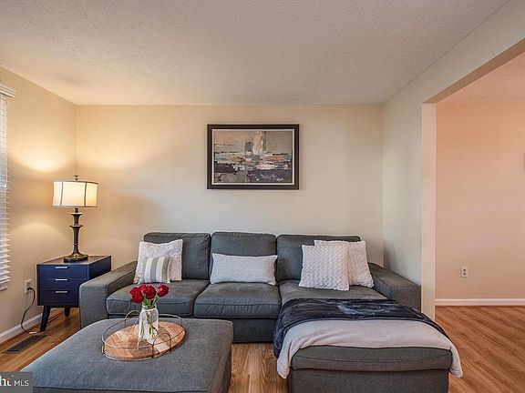 Spacious Living room Pergo Max flooring throughout