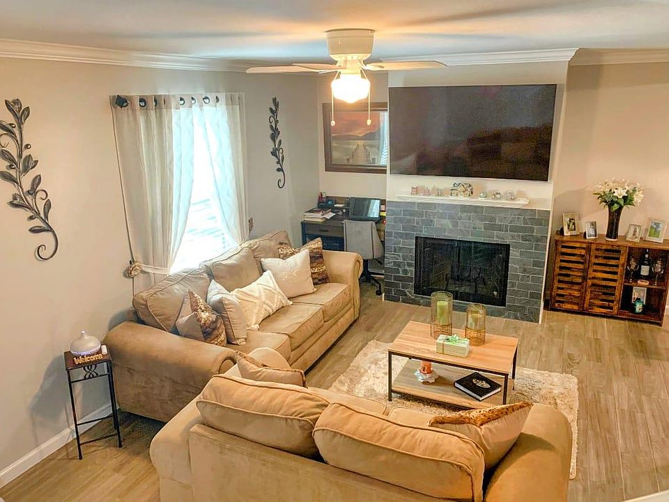 Nice living room with like wood tile floor.