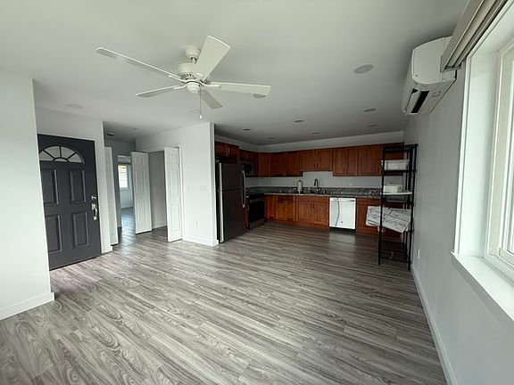 Full kitchen with stove/oven, fridge and dishwasher