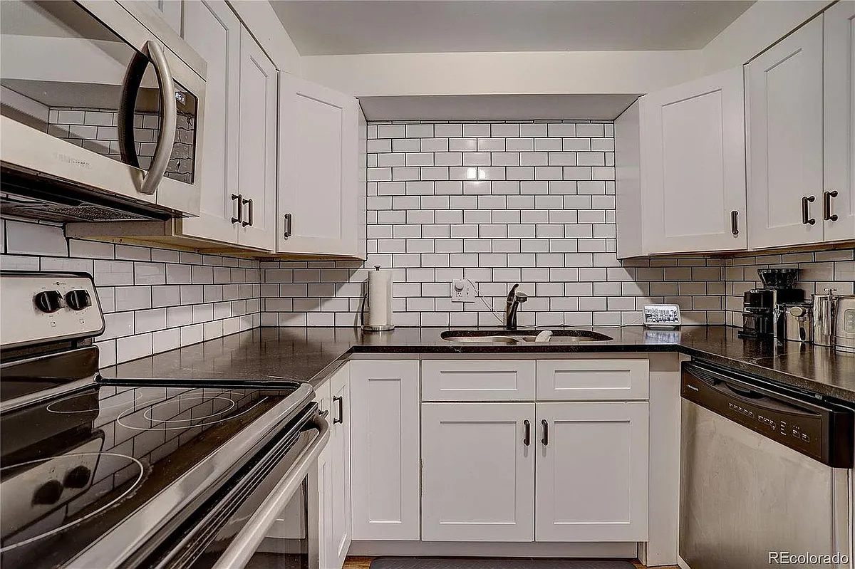 Building Photo - 3047 W 47th Ave #103