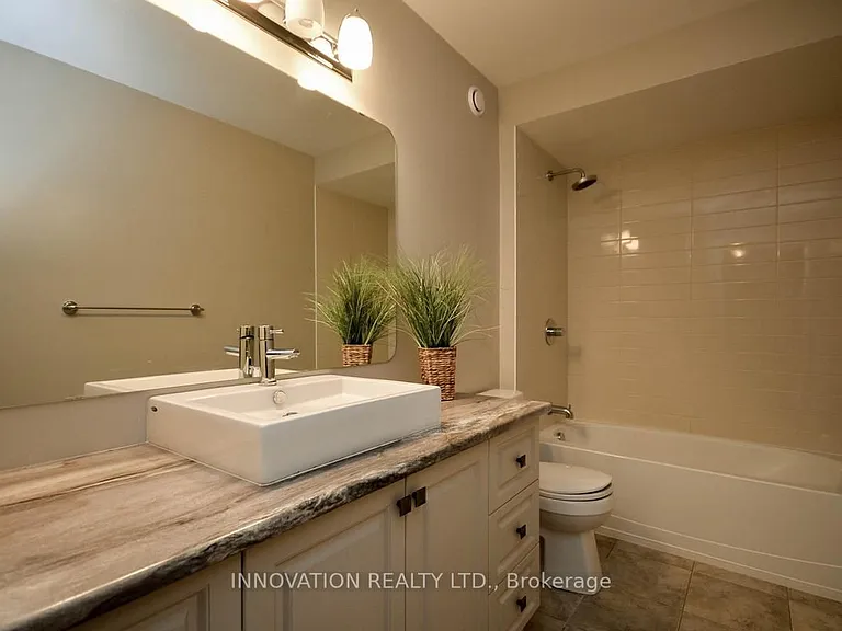 141 Highbury Park Dr — Photo 16
