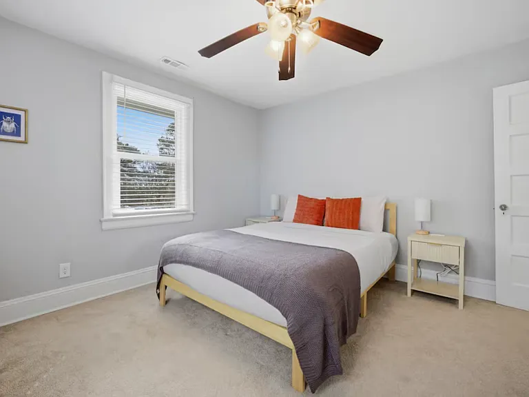 Bedroom 2: Another large bedroom with a Queen size bed and plenty of light