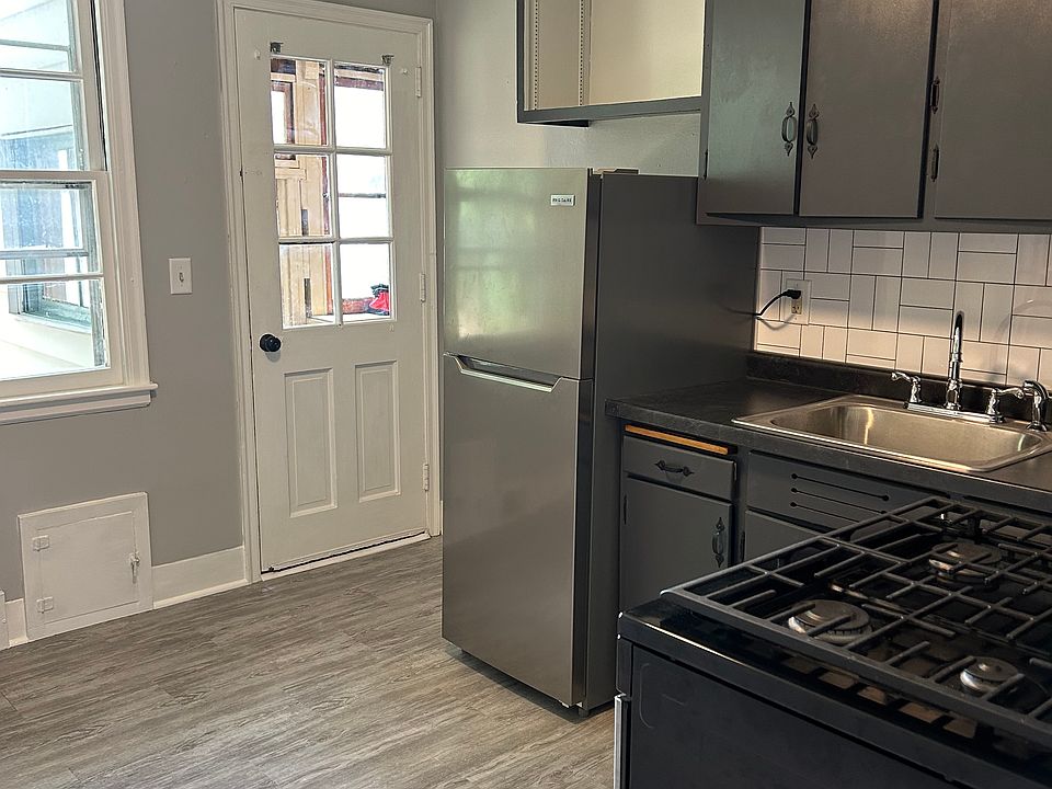 Kitchen with view of back door