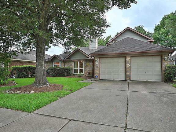 Double wide driveway with a great shaded yard