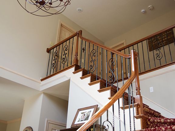 New carpet & iron spindles