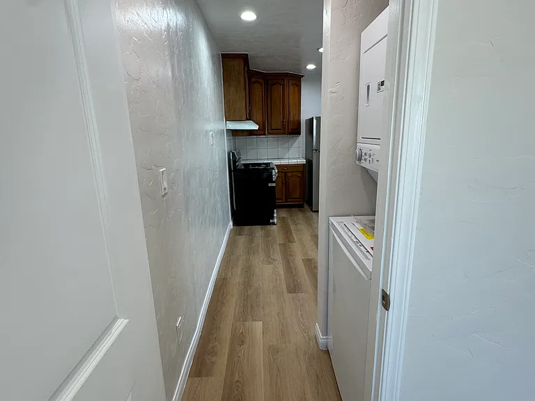 Hallway, washer & dryer