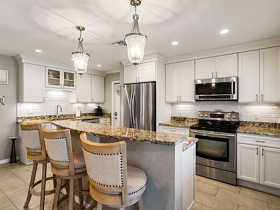 2nd image of 240 S Coconut Palm Blvd