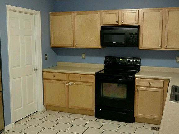 A view of kitchen and door to laundry room