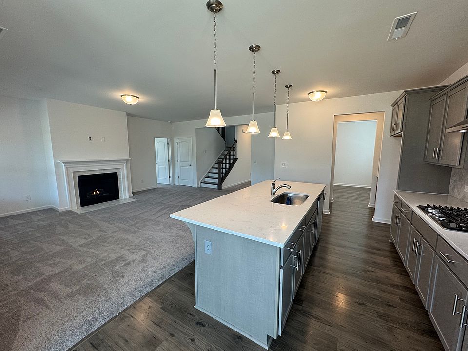 Large kitchen island and great room perfect for entertaining