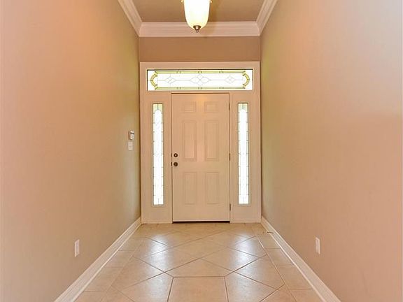 Foyer with ceramic tile