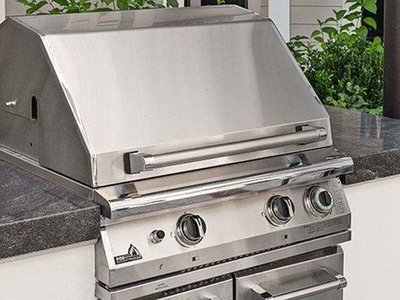 Outdoor kitchen with grilling stations