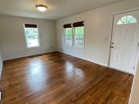 Living/family room with lots of natural light.