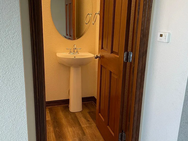 half bath is close to the family room and kitchen