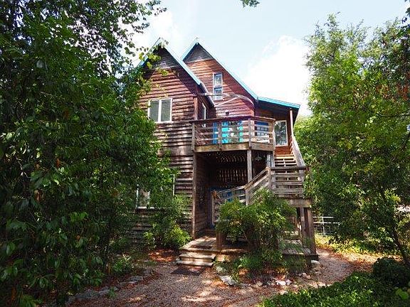 View from the front. All natural cedar siding.
