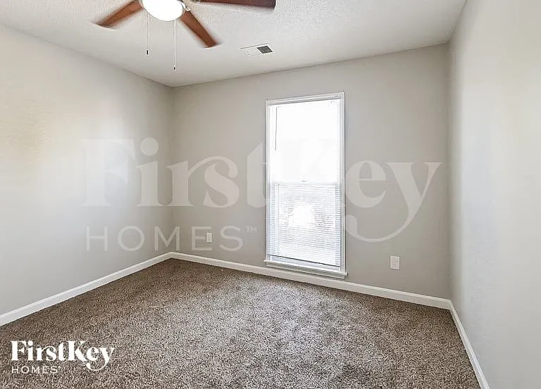 8690 Rivermill Cv — Photo 13