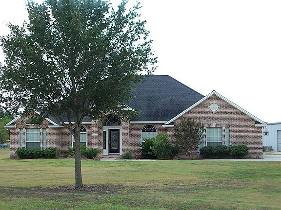 ALL THIS NESTLED ON JUST UNDER AN ACRE
