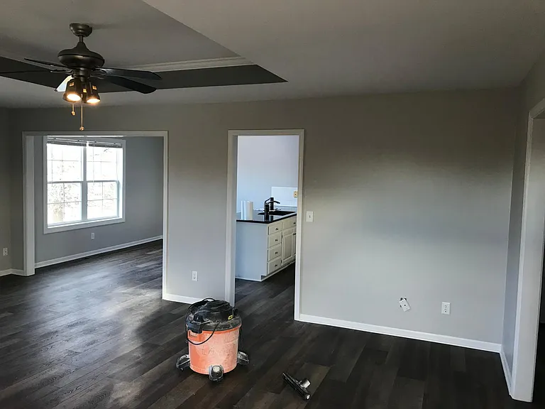 Living area showing access to kitchen and dining area