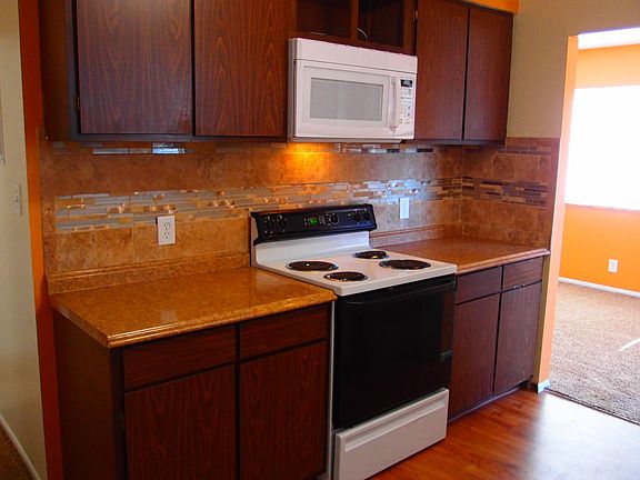 Kitchen has space saver microwave