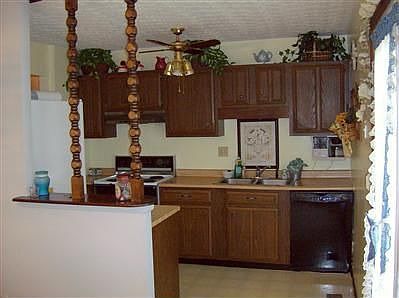 Natural wood cabinets in Kitchen