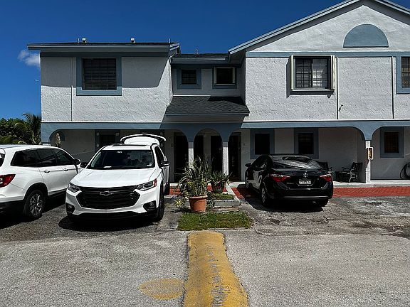 Front with 2 parking spots