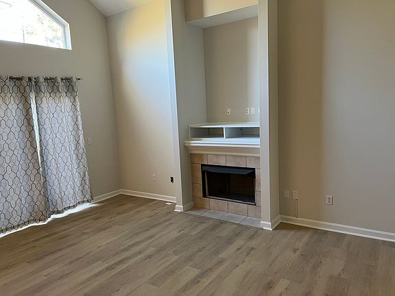 Living room, facing fireplace