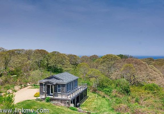 with charming two story guest cottage