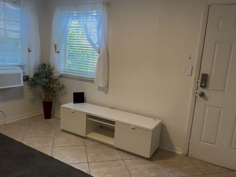 The position of the front door in reference to the living room