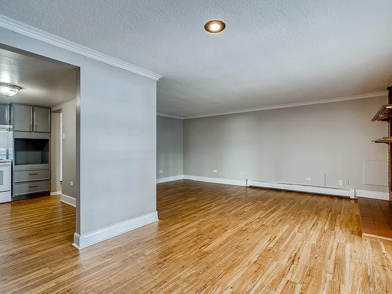 A Standard Living Room and Kitchen at Mondrian Colorado Apartments