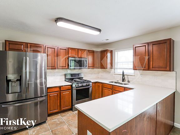 5th image of 6762 Auburn Ln