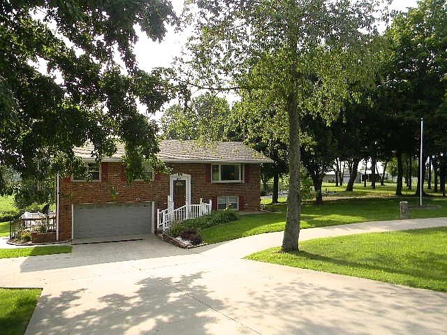 Located in the Country sitting on .98 acres of gorgous land.