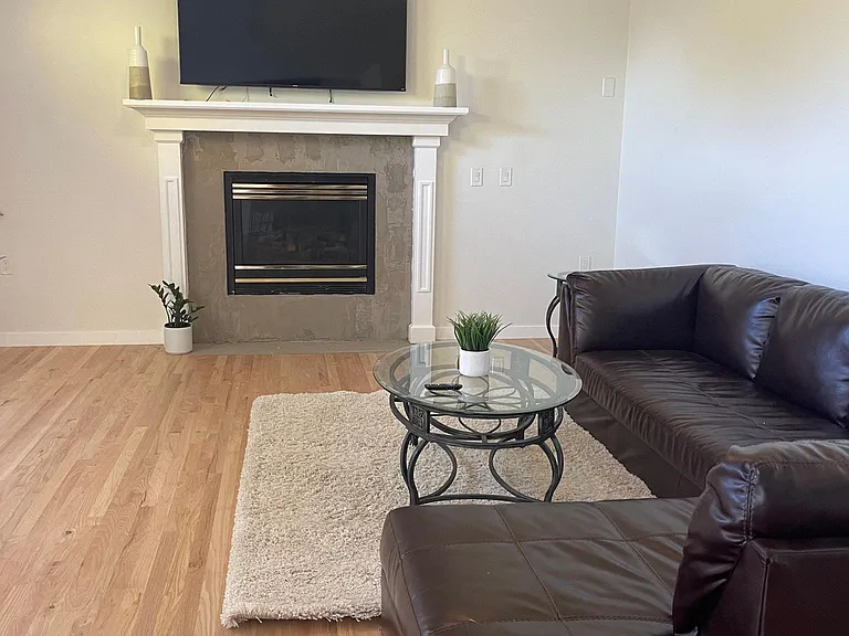 New hardwood floors on main level. Upper level has new flooring as well(luxury laminate )