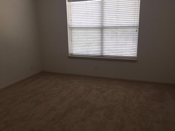 2 equally size windowed bedrooms upstairs with new carpet.