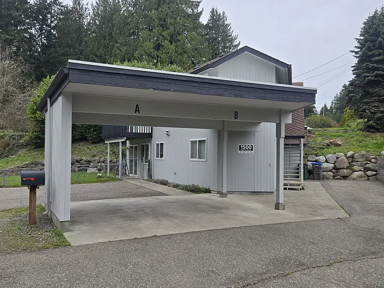 One generous sized, lit & marked carport parking spot. additional off street parking for 1 vehicle. No rv's or trailers. (max two vehicles).