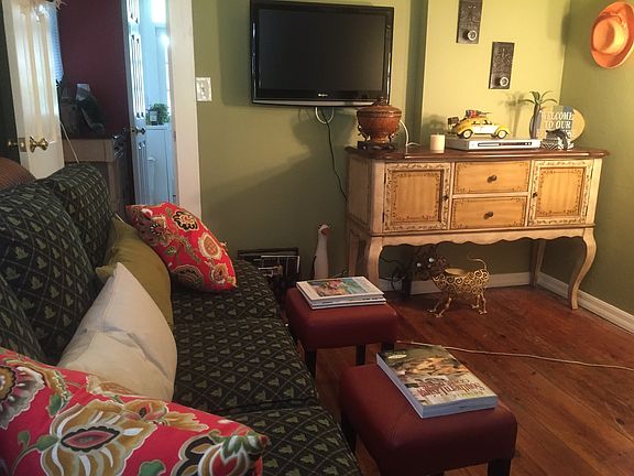 Back Bedroom w/ couch and Bath