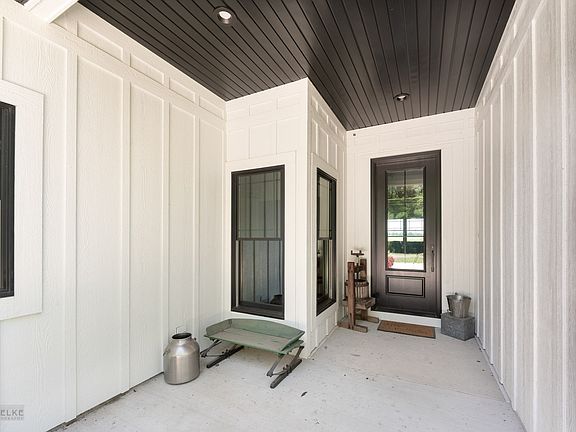 Great covered entry to welcome guests and to protect package deliveries from the weather.