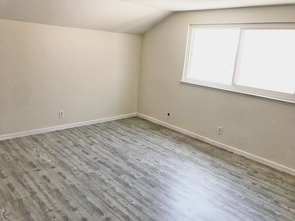 3 of 4 BR. New paint (ceiling/walls), new flooring.