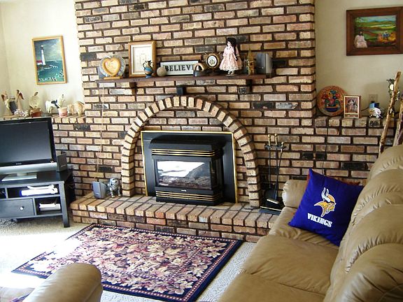 Snuggle up by the gas fireplace in the family room w/walk out to backyard.