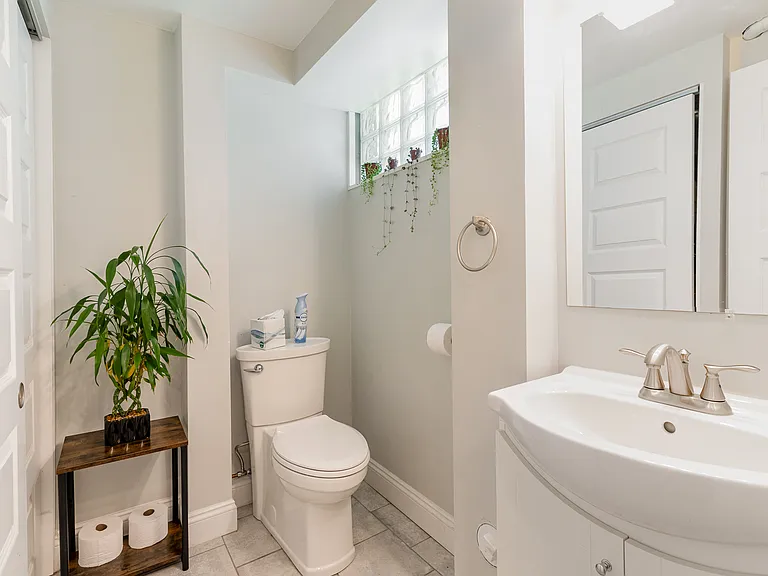 Bathroom next to laundry