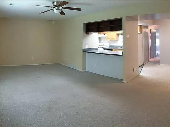 View From Living Room Into Dining Room, Kitchen and Hallway