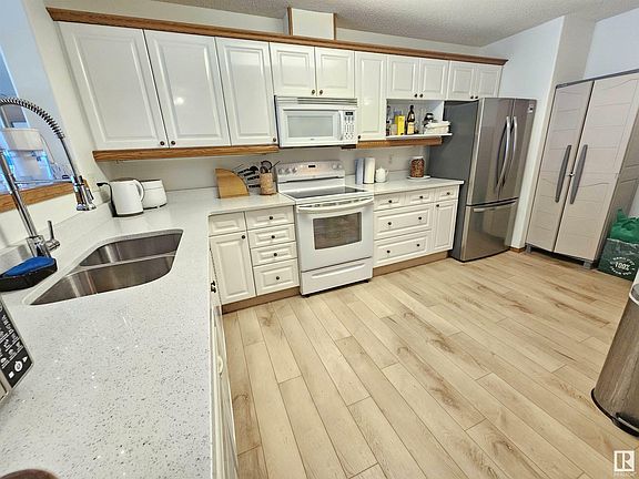 2nd image of 7839 96th St NW #107