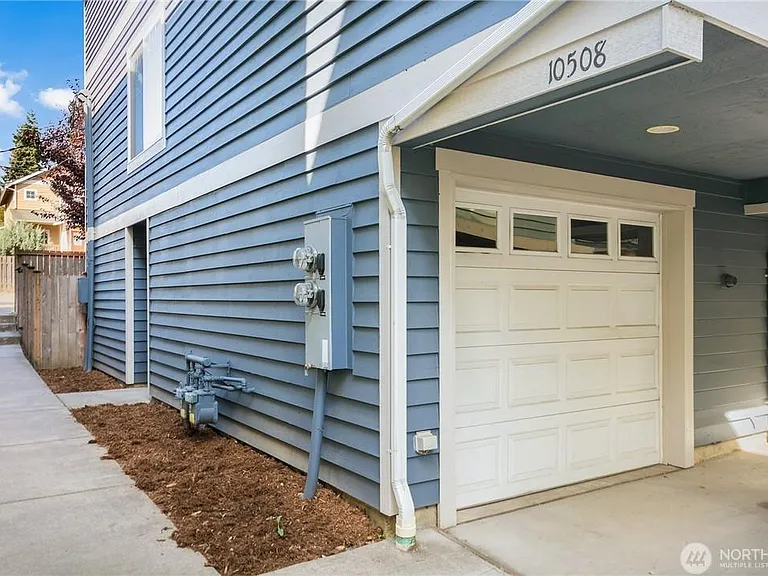 Attached Garage and space in front of garage is available for parking too.