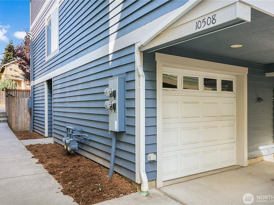 Attached Garage and space in front of garage is available for parking too.