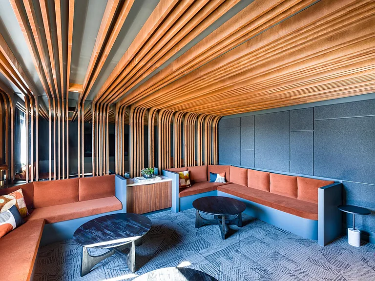 Unwind in style at Modera Raleigh Hills _ our expansive clubroom with plush lounge seating is the perfect place to relax, recharge, or connect with neighbors.