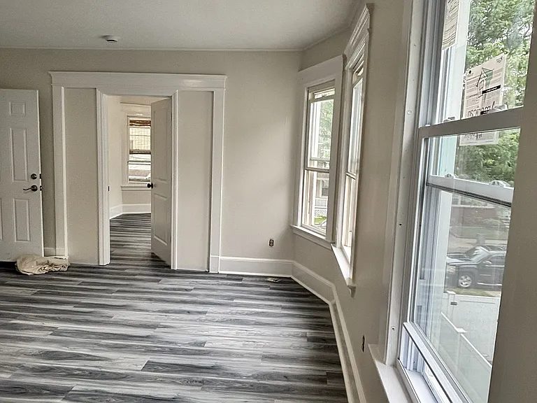 Living Room bright with lots of windows