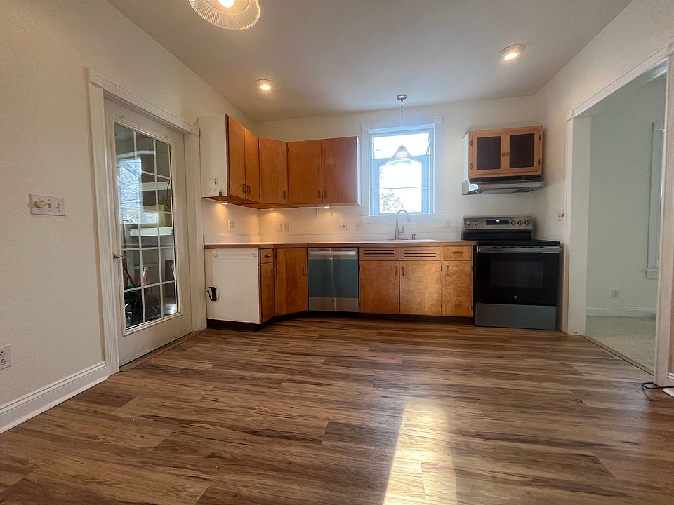 Large Eat In Kitchen with brand new dishwasher and Electric Stove.