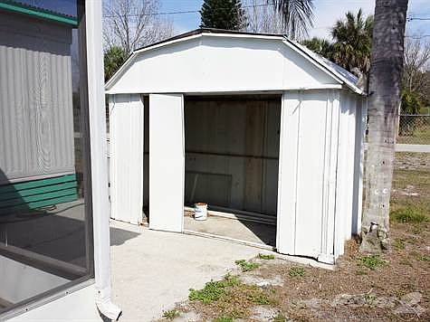 SHED BEHIND SCREENED IN PORCH