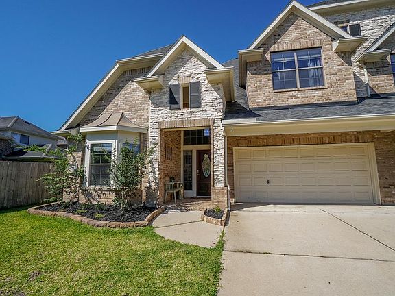 The attention to detail is apparent before you even enter the property. With features like oversized windows, full brick and stone facade and 2-story, front entryway, this home is stunning.