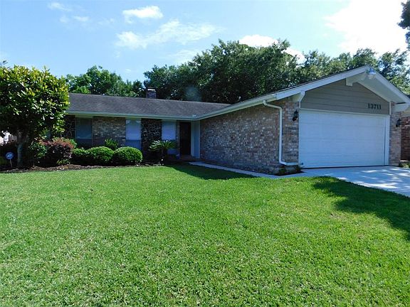 Inviting entry and nicely landscaped
