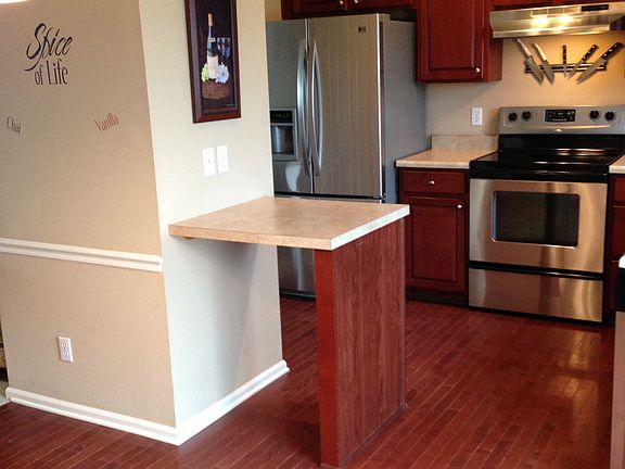 Pantry, cherry cabinets, che