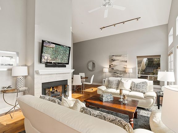 Warm and cozy gas log fireplace in Family Room
